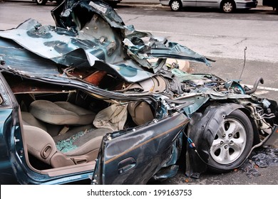 generic-compact-car-damaged-rollover-260nw-199163753.jpg