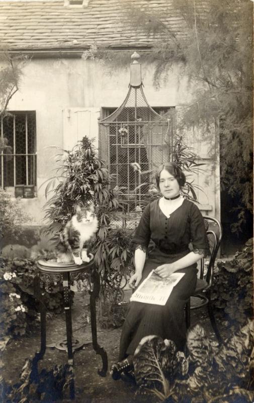 SteampunkTendencies_ParisianWomanCannabisGarden_03-647x1024.jpg - Parisian woman with cat circa 1910