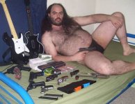 fat naked man with gun.jpg