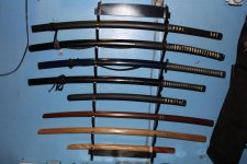 Sword collection, fourth sword down is Iaido blade (no edge).jpg