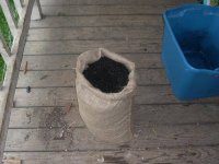 Burlap bag with 12 gallons soil ready to go
